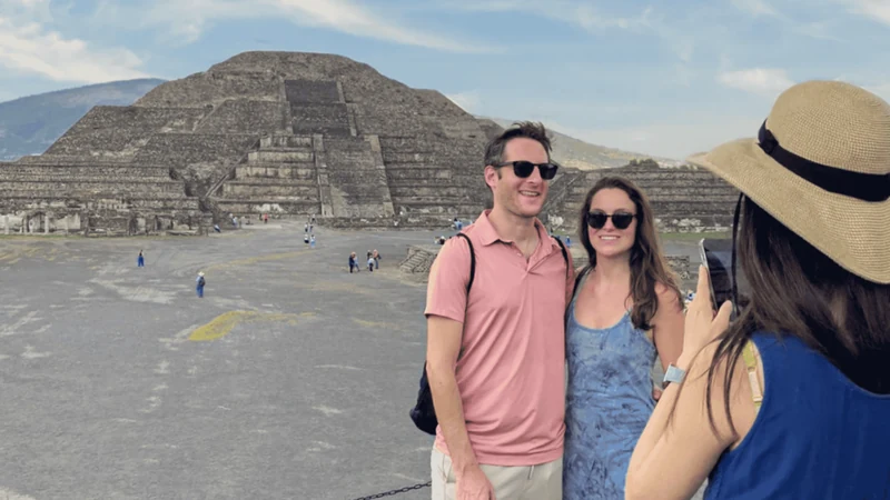Early-access visitors on the quiet Avenue of the Dead at sunrise on a small-group Teotihuacan pyramids tour